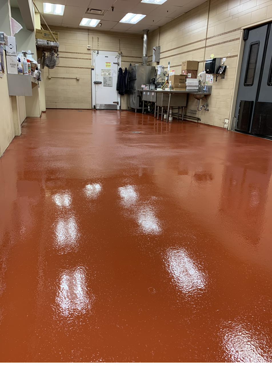 Terracotta epoxy floor coating in a southern Wisconsin commercial kitchen
