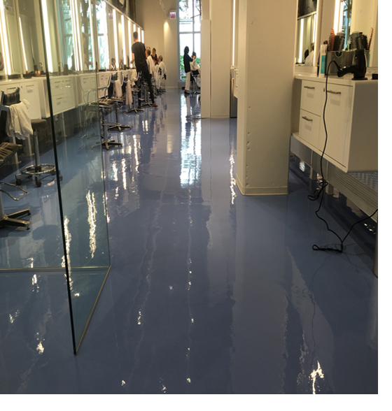 Blue metallic epoxy floor coating in a Wisconsin hair salon